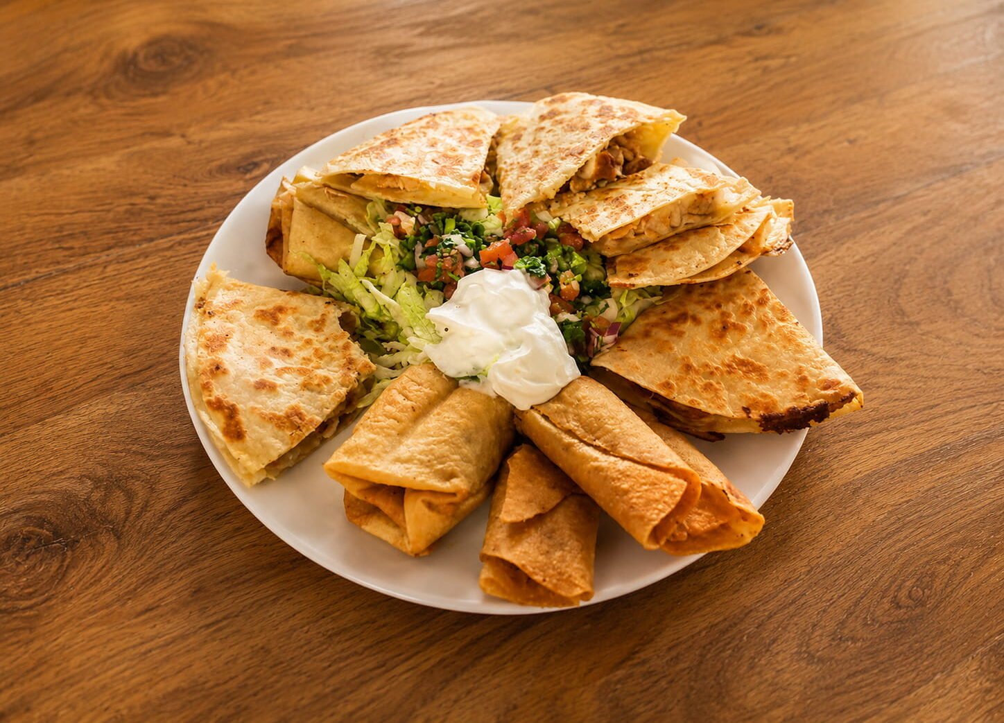 Mexican appetizers on a wooden table