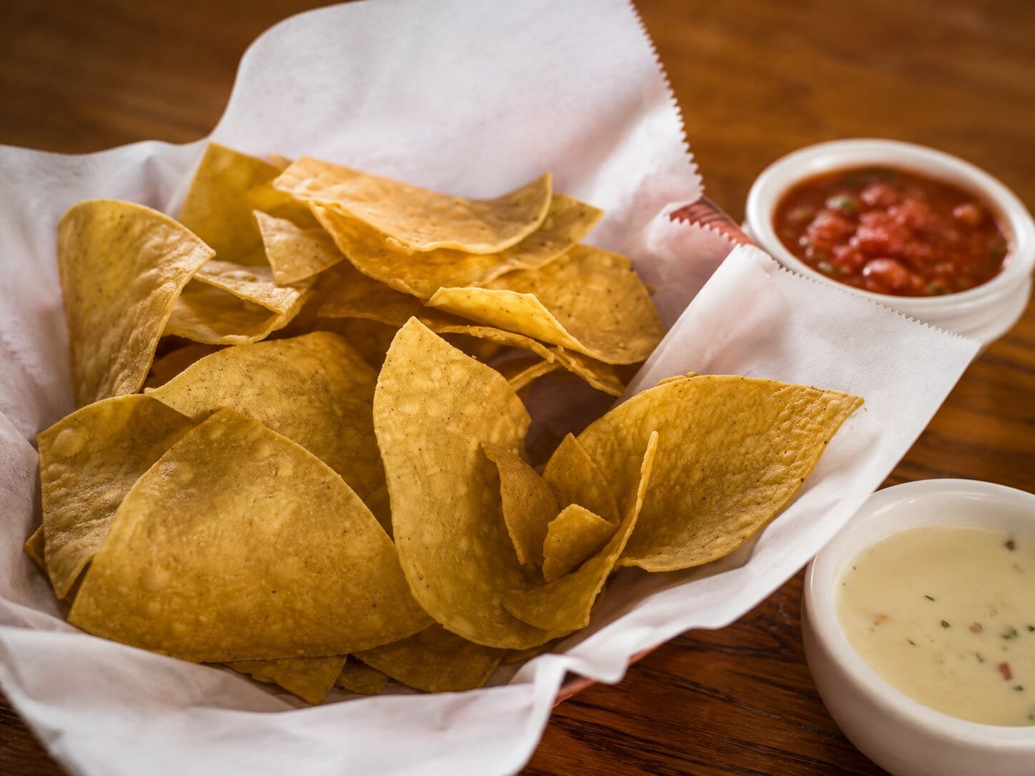 Tortilla chips with salsa and dip