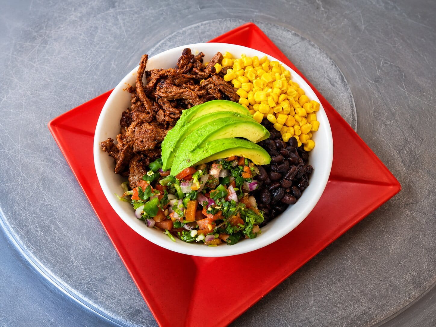 Vibrant Tex Mex grain bowl close up